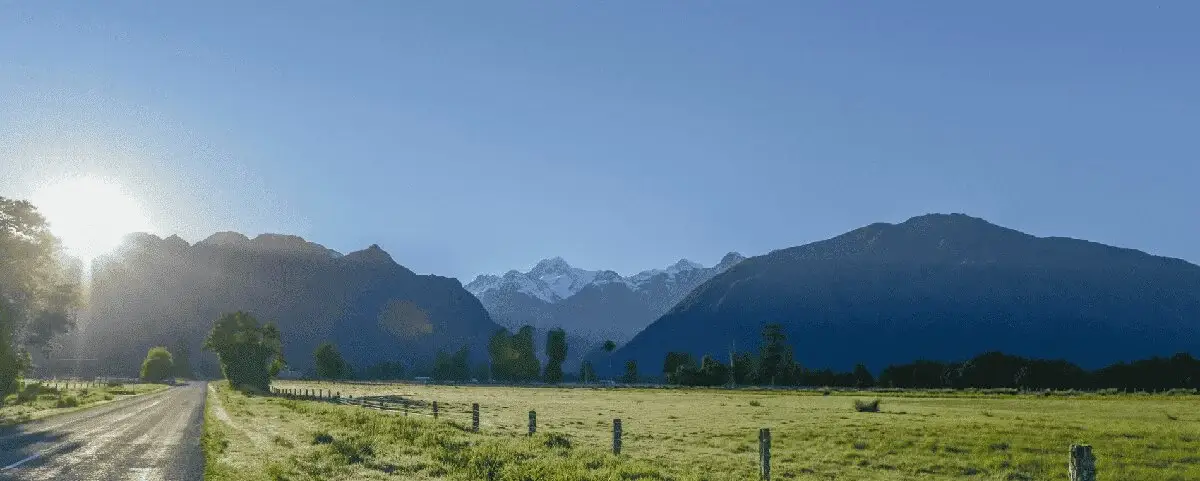Scenic view of Virginia mountains at sunrise with a peaceful rural landscape.