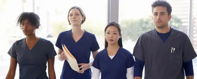 Group of diverse healthcare professionals representing job growth after the Aureus Medical & Medical Solutions merger