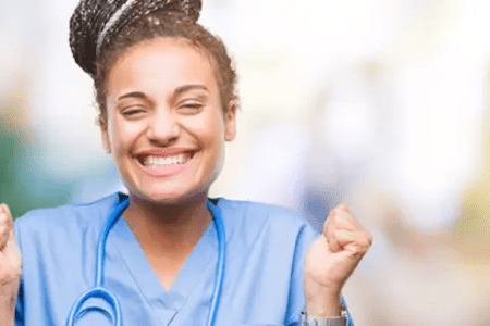 Happy Med Surg Travel Nurse Celebrating a New High Paying Assignment 450x300