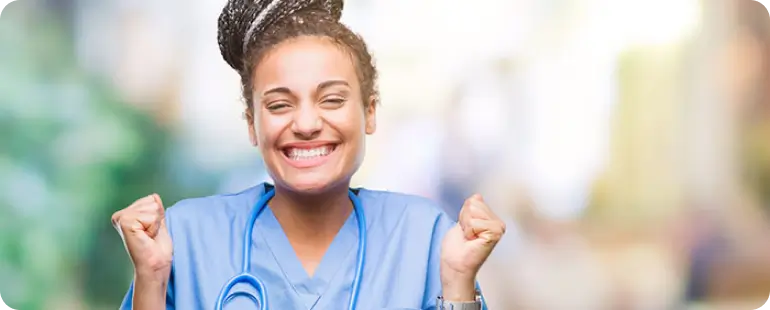 Excited med surg travel nurse smiling after landing a top paying assignment in 2025