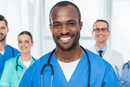 Confident agency nurse with supportive medical team 450x300