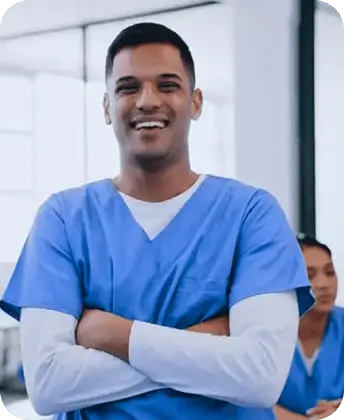 Travel allied health professional working in a hospital during a travel assignment